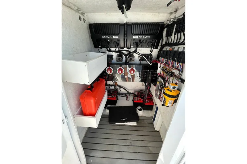 Slide: The Image of Electrical compartment of a 2006 Whitewater 28 boat with Garmin equipment and wiring. - 15
