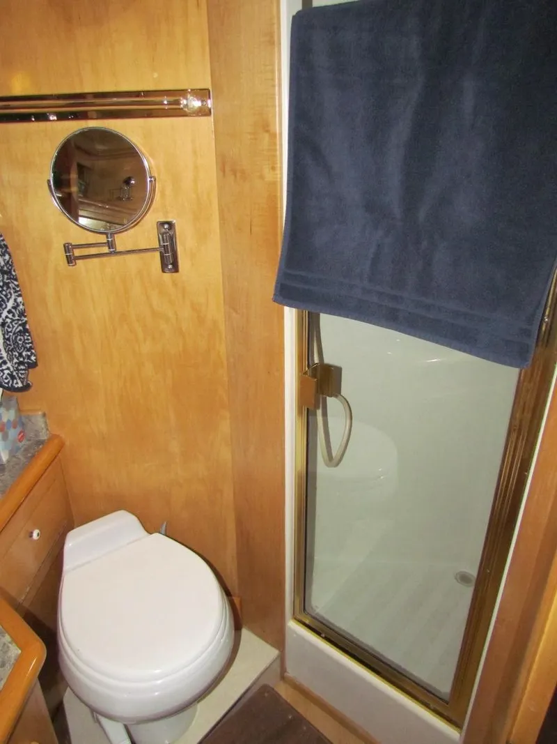 Slide: The Image of Bathroom interior of 1998 Navigator 53 yacht with shower and toilet. - 33