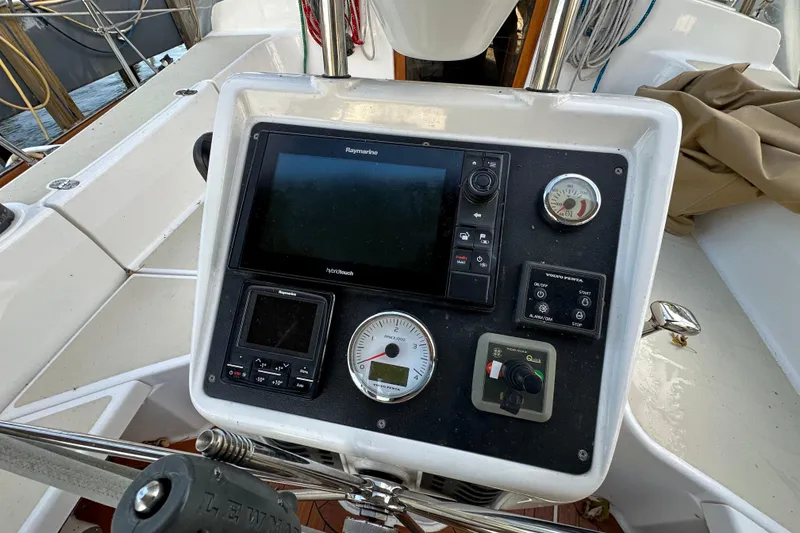 Slide: The Image of Control panel of a 2017 Tartan 4300 sailboat with navigation instruments. - 10