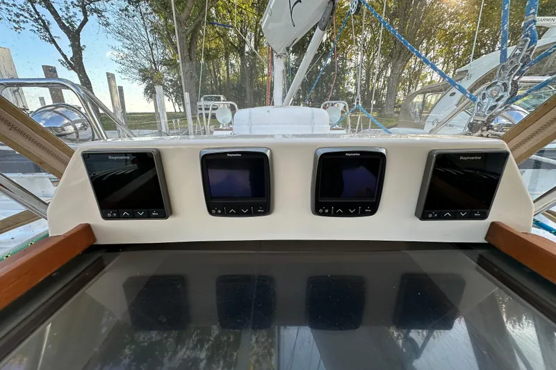 Slide: The Image of Control panel of a 2017 Tartan 4300 sailboat with Raymarine displays. - 12
