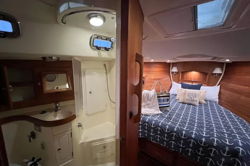 Slide: The Image of Cozy interior of 2017 Tartan 4300 sailboat with bedroom and bathroom. - 18