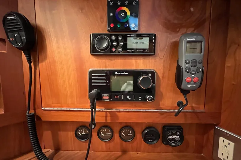 Slide: The Image of Control panel of a 2017 Tartan 4300 yacht with communication devices and gauges. - 47