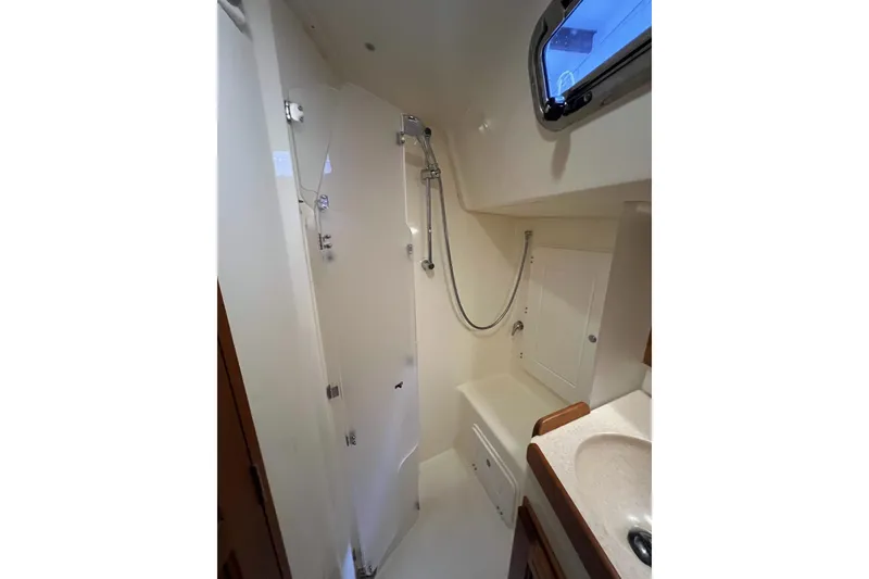 Slide: The Image of Bathroom interior of 2017 Tartan 4300 yacht with shower and sink. - 54