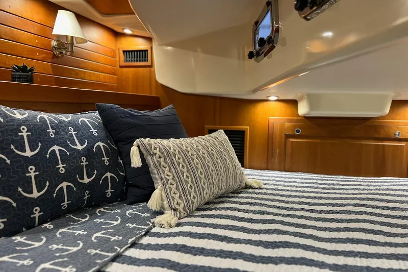 Slide: The Image of Cozy Tartan 4300 yacht cabin with nautical-themed bedding, 2017 model. - 59
