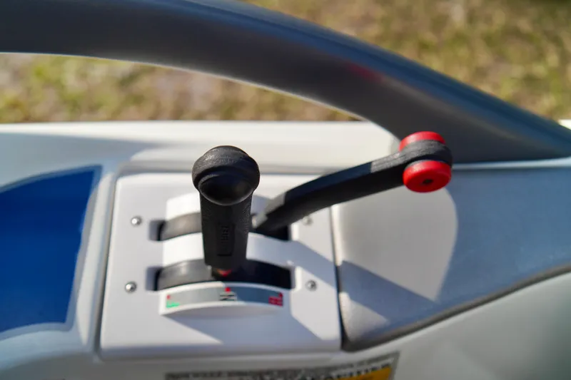Slide: The Image of Control levers of a 2001 Bombardier 1800 Challenger boat. - 17