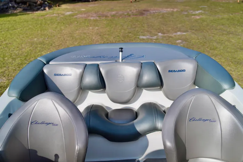 Slide: The Image of 2001 Bombardier 1800 Challenger boat interior with Sea-Doo branding and leather seats. - 19