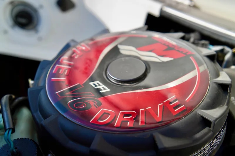 Slide: The Image of Close-up of a 2001 Bombardier 1800 Challenger engine with V6 EFI Jet Drive. - 23