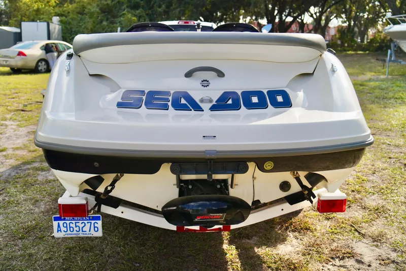 Slide: The Image of Rear view of a 2001 Bombardier Sea-Doo 1800 Challenger boat on a trailer. - 26