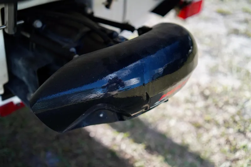 Slide: The Image of Close-up of a 2001 Bombardier 1800 Challenger boat component, showing a black protective cover. - 28