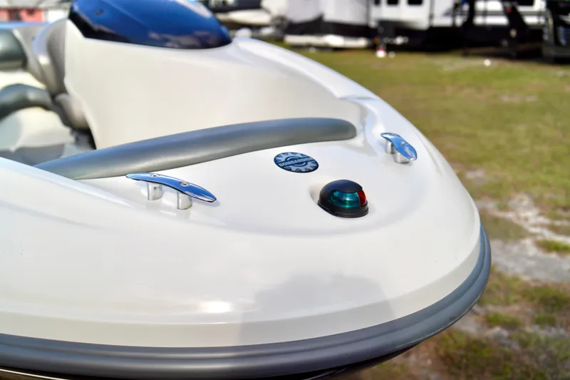 Slide: The Image of Close-up of 2001 Bombardier 1800 Challenger boat's bow with cleats and navigation light. - 7