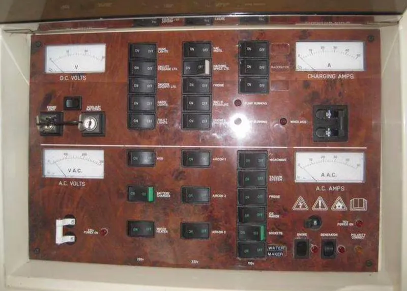 Slide: The Image of Control panel of a 1998 Viking Sports Cruiser, featuring voltage and amperage gauges. - 31