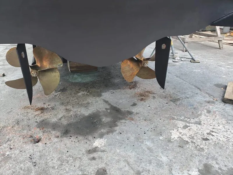 Slide: The Image of Propellers of a 1998 Viking Sports Cruiser on a concrete surface. - 37