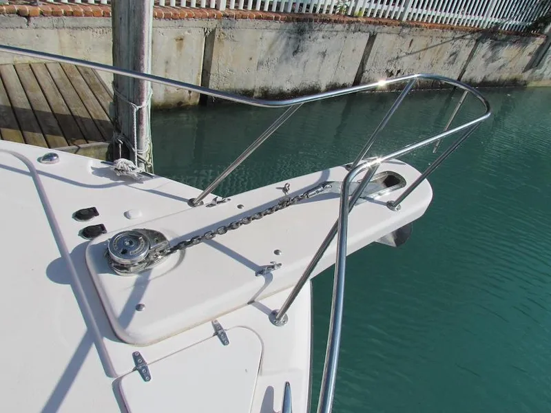 Slide: The Image of 2008 Grady-White Express 360 boat bow with anchor chain and railing. - 2