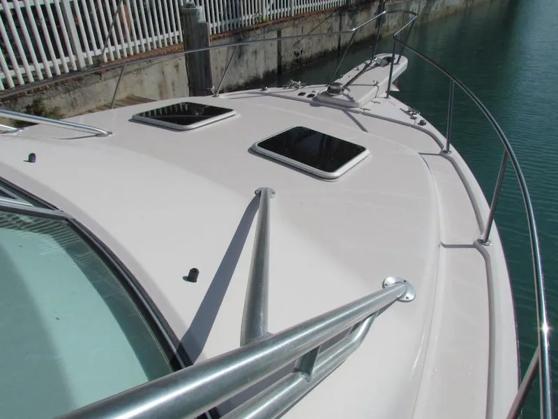 Slide: The Image of 2008 Grady-White Express 360 boat deck with railings and hatches. - 3
