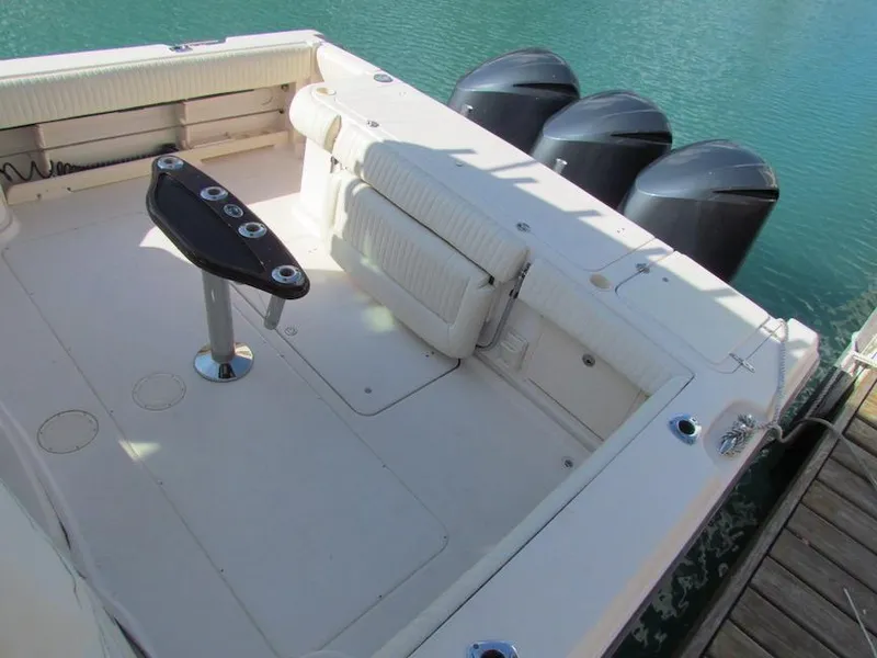 Slide: The Image of 2008 Grady-White Express 360 boat deck with triple outboard motors. - 32