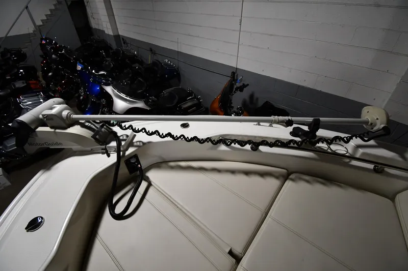 Slide: The Image of 2022 Boston Whaler 250 Dauntless boat interior with seating and equipment. - 41