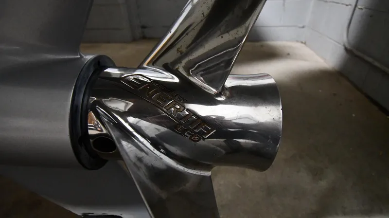 Slide: The Image of Close-up of a stainless steel boat propeller on a 2022 Boston Whaler 250 Dauntless. - 7