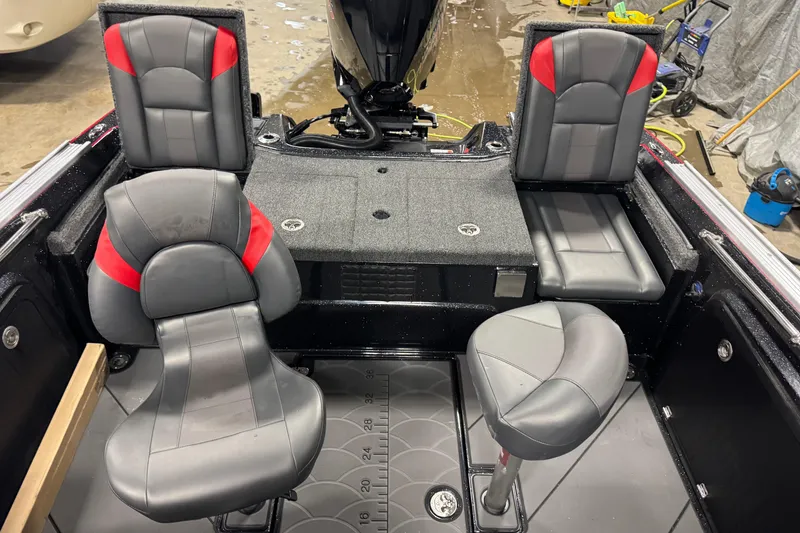 Slide: The Image of 2026 Nitro ZV20 Sport Pro boat interior with gray and red seating. - 11