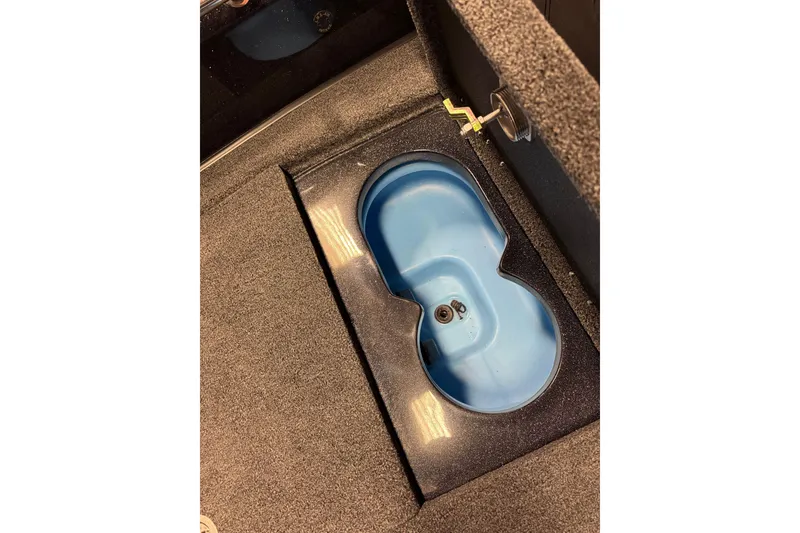 Slide: The Image of Blue compartment in 2026 Nitro ZV20 Sport Pro boat interior. - 17