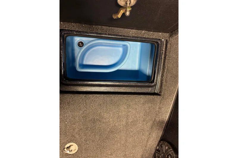 Slide: The Image of Blue storage compartment in 2026 Nitro ZV20 Sport Pro boat interior. - 18