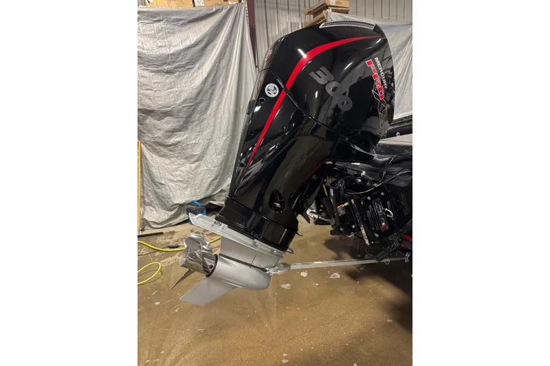 Slide: The Image of 2026 Nitro ZV20 Sport Pro boat engine in a workshop setting. - 6