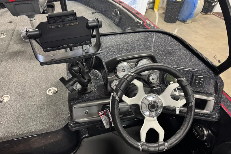 Slide: The Image of Steering console of 2026 Nitro ZV20 Sport Pro boat with modern controls and gauges. - 8