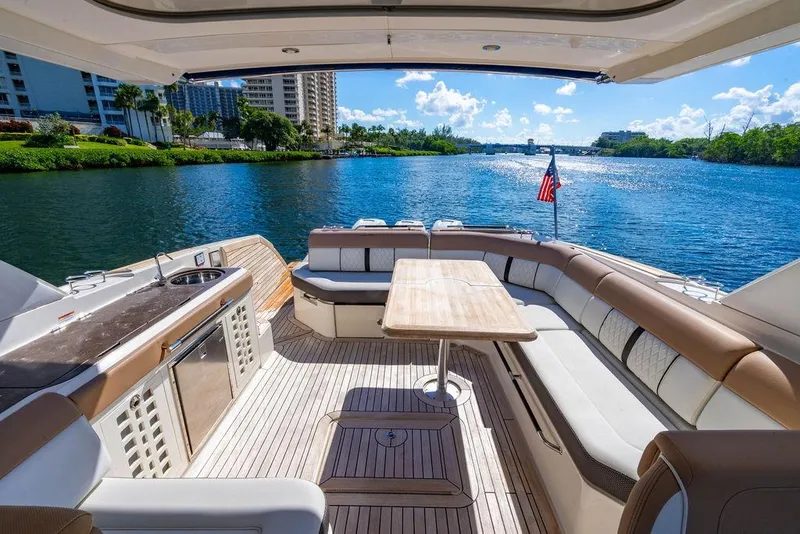 Slide: The Image of Luxurious 2019 Sea Ray SLX 400 Outboard yacht interior with scenic waterway view. - 24