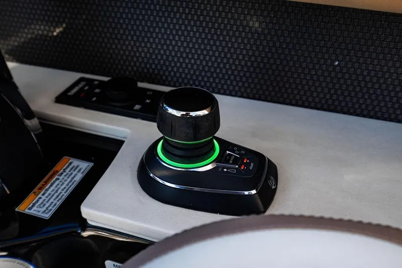 Slide: The Image of Joystick control on 2019 Sea Ray SLX 400 Outboard boat dashboard. - 40