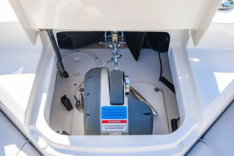 Slide: The Image of 2019 Sea Ray SLX 400 Outboard anchor compartment with chain and winch system. - 60