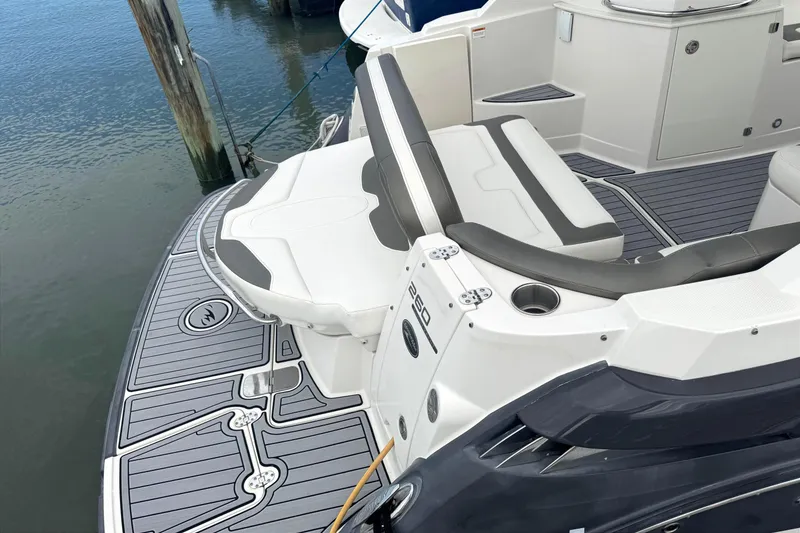 Slide: The Image of 2013 Monterey 260 SCR boat with sleek seating and modern deck design. - 3