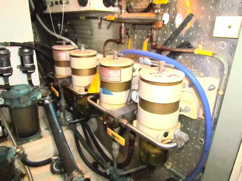 Slide: The Image of Engine room machinery with pipes and filters, Hyatt model 55, 1997. - 34