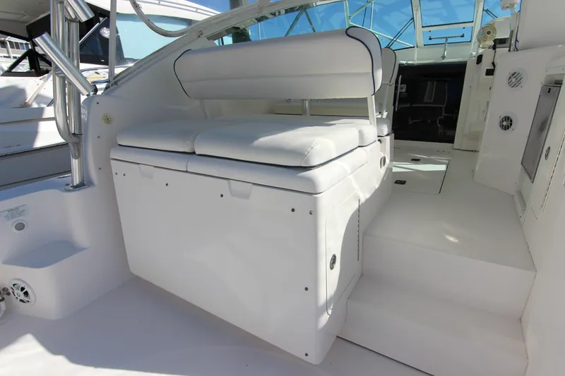 Slide: The Image of 2008 Bertram 360 boat interior with white seating and sleek design. - 20