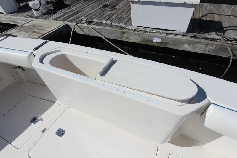 Slide: The Image of 2008 Bertram 360 boat deck with storage compartment, dockside view. - 23