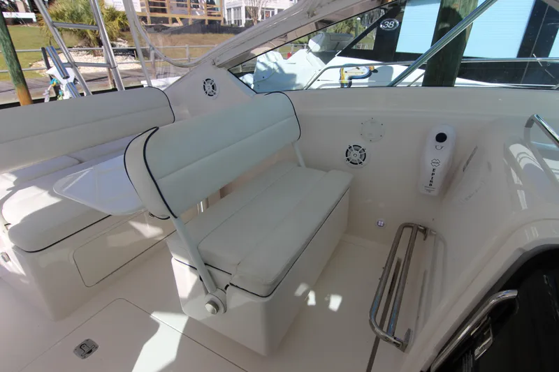 Slide: The Image of Interior of a 2008 Bertram 360 yacht with white seating and modern amenities. - 35