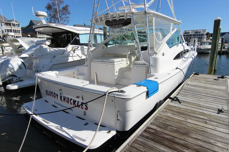 Slide: The Image of 2008 Bertram 360 boat docked at marina, named "Bloody Knuckles," Southport, NC. - 4