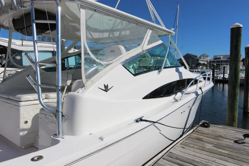 Slide: The Image of 2008 Bertram 360 yacht docked at marina, showcasing sleek design and modern features. - 5