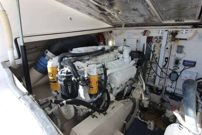 Slide: The Image of Engine room of a 2008 Bertram 360 yacht, showcasing detailed machinery and components. - 51