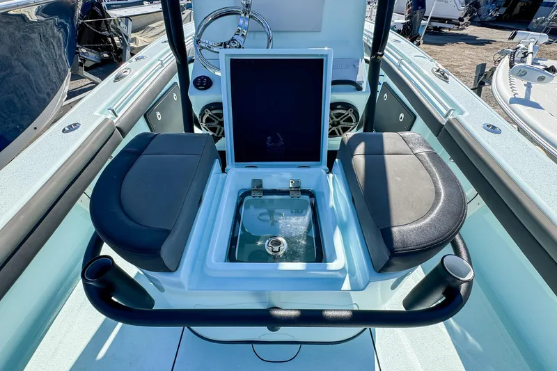 Slide: The Image of 2019 Yellowfin 26 Hybrid boat interior with seating and storage compartments. - 17