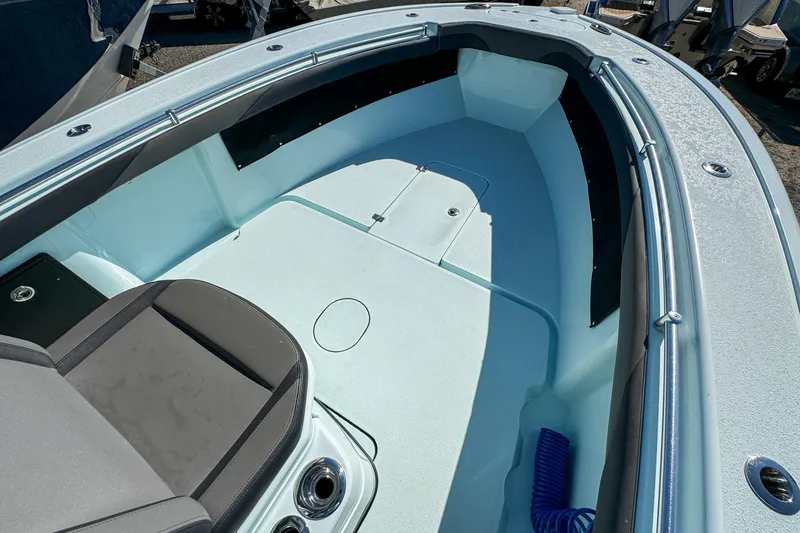 Slide: The Image of 2019 Yellowfin 26 Hybrid boat interior with spacious deck and seating. - 25