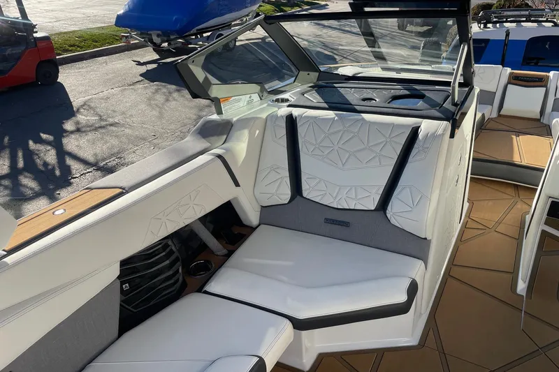 Slide: The Image of 2025 Nautique Super Air Nautique G25 Paragon interior with luxurious seating and modern design. - 10