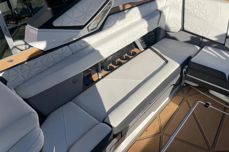Slide: The Image of Luxurious interior of 2025 Nautique Super Air Nautique G25 Paragon boat. - 7