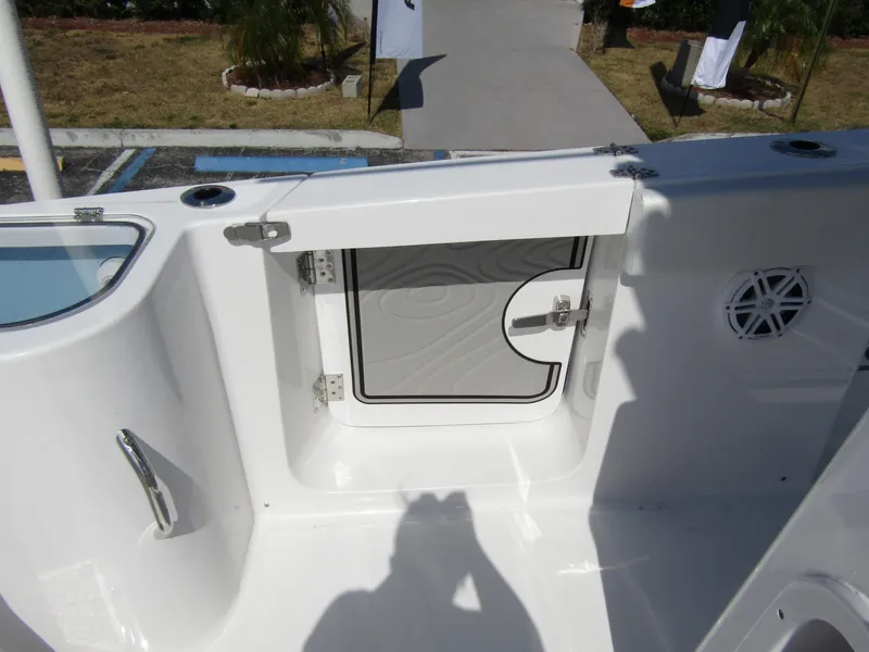 Slide: The Image of 2024 Wellcraft 263 Fisherman boat interior storage compartment. - 26
