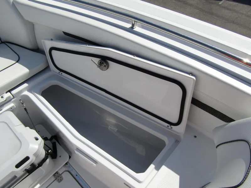 Slide: The Image of 2024 Wellcraft 263 Fisherman boat storage compartment. - 6