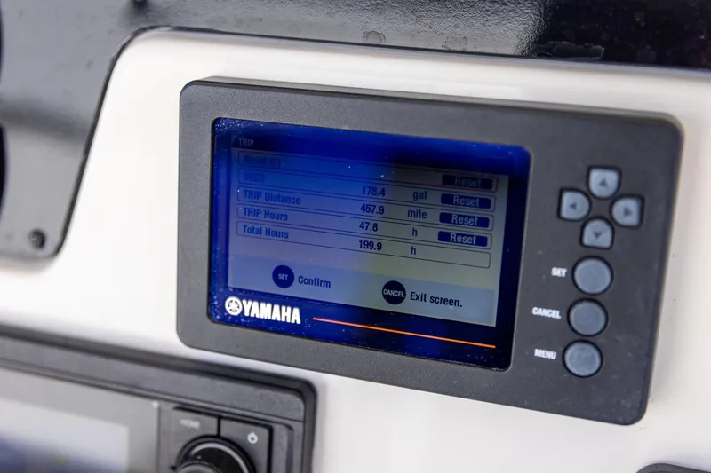 Slide: The Image of Yamaha display on 2018 Sailfish 241 CC showing trip data and settings. - 17