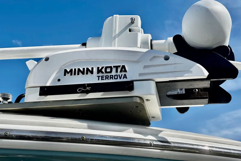 Slide: The Image of Minn Kota Terrova motor on 2018 Sailfish 241 CC boat under clear blue sky. - 6