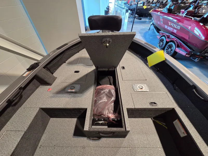 Slide: The Image of Interior view of 2026 Crestliner 1850 Pro Tiller with storage compartments. - 8