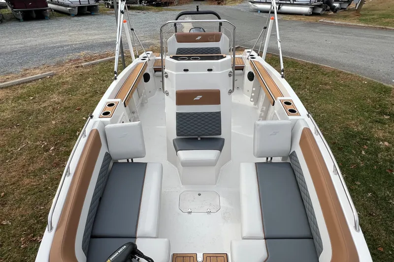 Slide: The Image of 2026 Starcraft SVX 191 OB CC boat interior with stylish seating and modern design. - 18