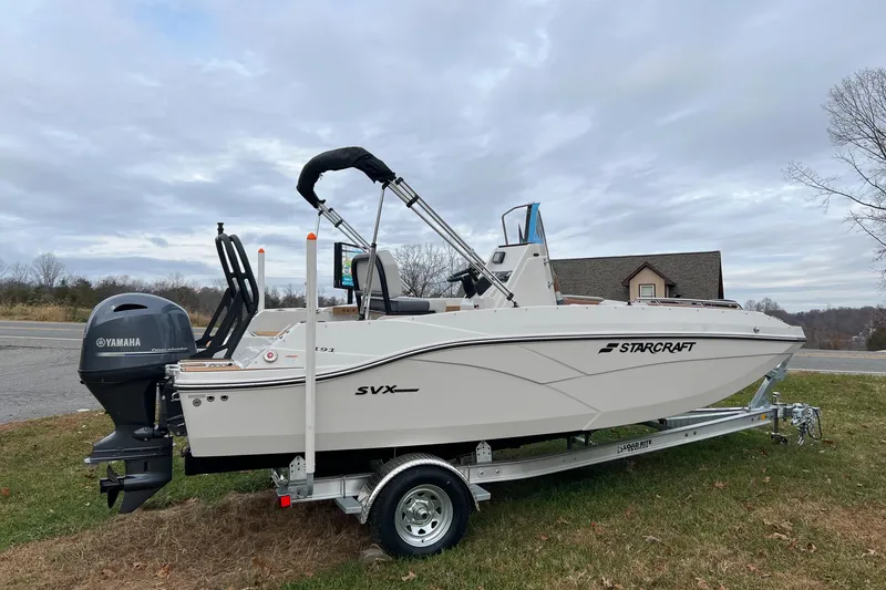 Slide: The Image of 2026 Starcraft SVX 191 OB CC boat on trailer with Yamaha outboard motor. - 4