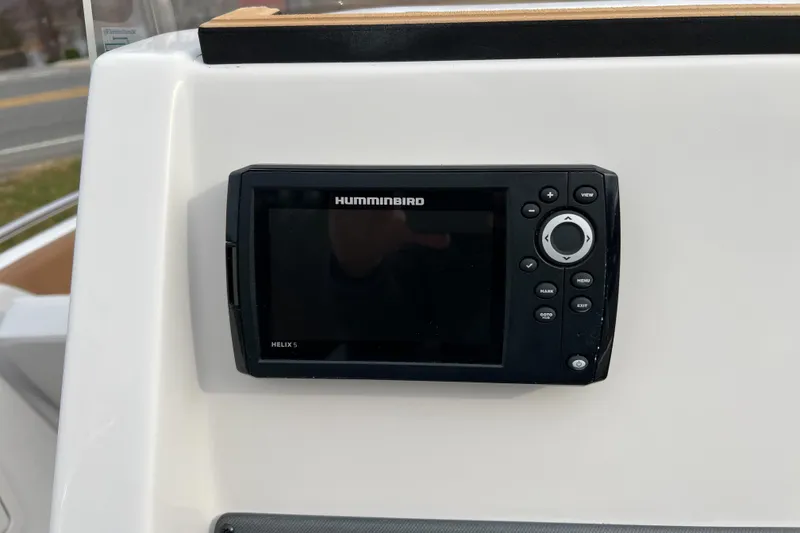 Slide: The Image of Humminbird Helix 5 fish finder on 2026 Starcraft SVX 191 OB CC boat dashboard. - 6