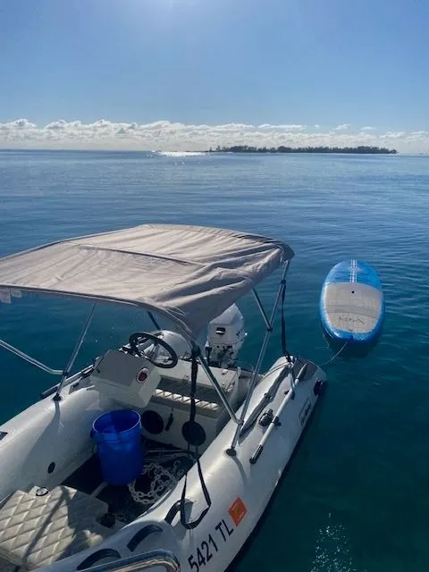 Slide: The Image of Jefferson 52 Pilothouse SE 2007 boat on calm water with paddleboard. - 49